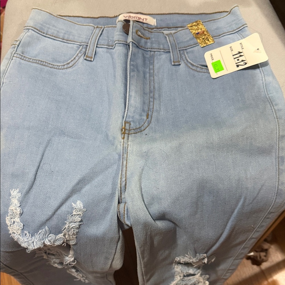 Vibrant High Rise Light Blue Distressed Jeans